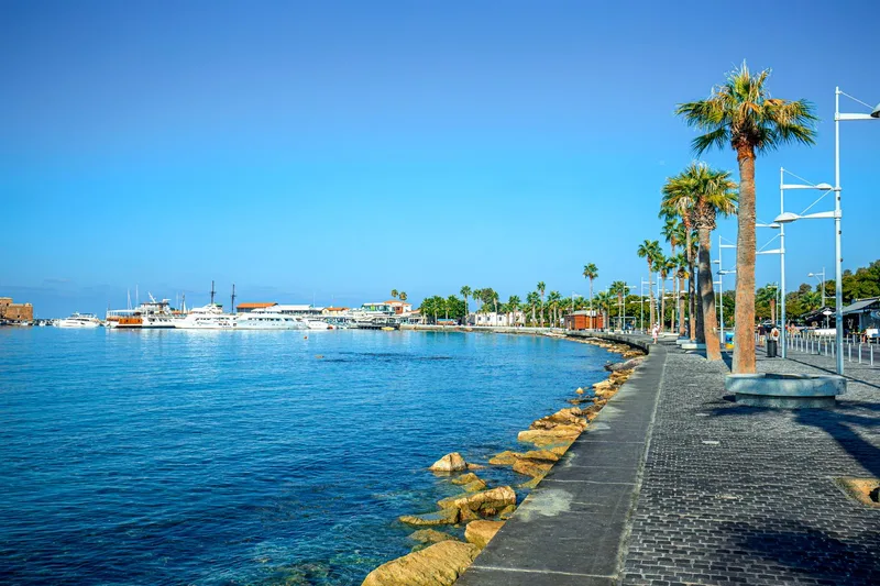 A Mediterranean harbour in Cyprus, weighed against life in Paraguay