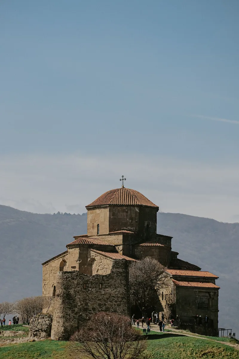 A monastery in the Georgian Caucasus, weighed in a Paraguay vs Georgia comparison