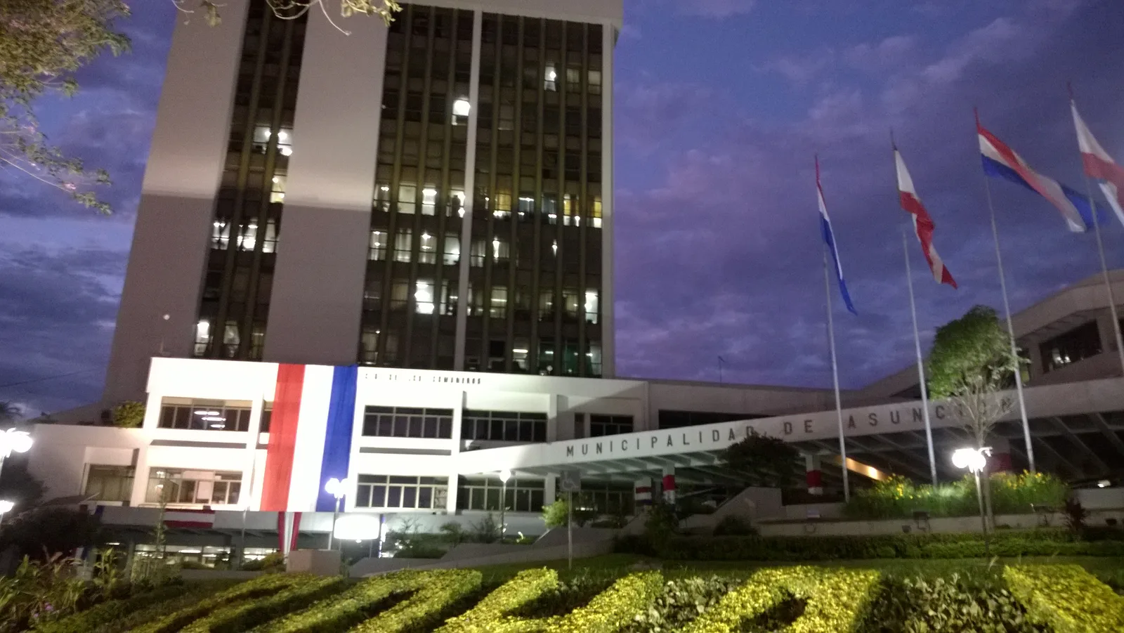 The Municipalidad de Asunción at dusk: the kind of counter where Paraguayan certificates are issued