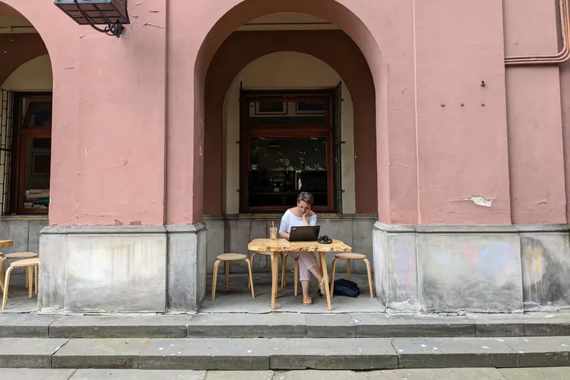 A digital nomad working remotely from a cafe in Asunción, Paraguay